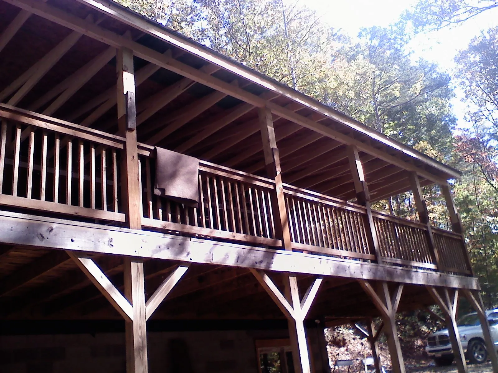 Timber framing under a new elevated porch and deck — Roof Leak Repair in Exeter by Roofing Brothers